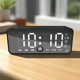 Digital clock with multiple functions on a wooden surface
