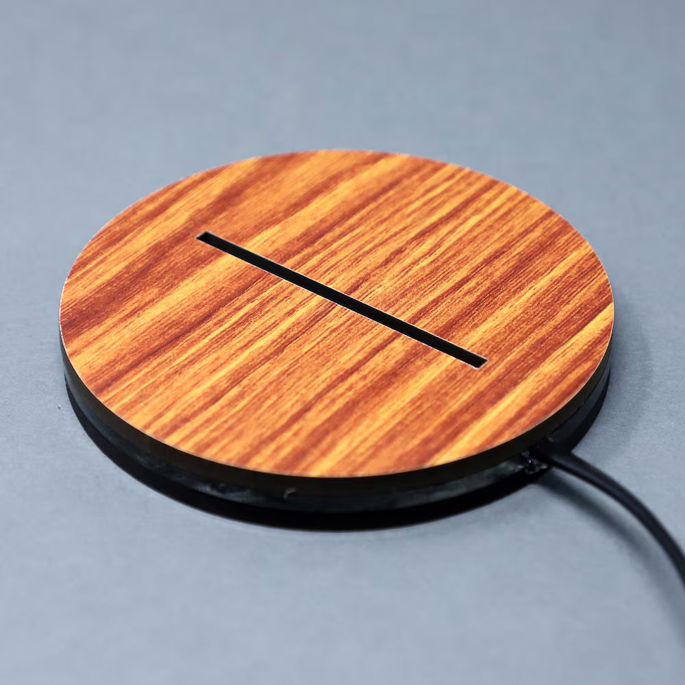 Wood-textured circular LED lamp base with a slot for acrylic panel, designed for stylish ambient lighting in home décor settings.