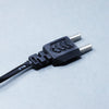 Close-up of the LED lamp's power plug with dual-pin design, compatible with standard home sockets for easy setup and use.