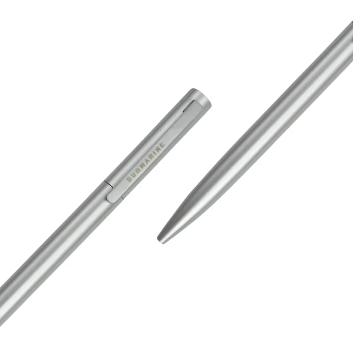 Silver pen on a white background