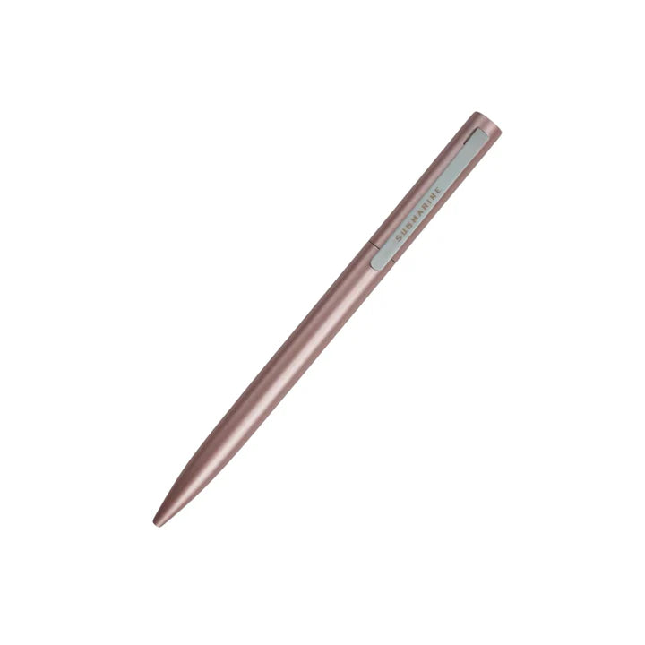 Rose gold pen on a white background