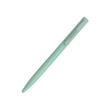 Mint green pen on a white background