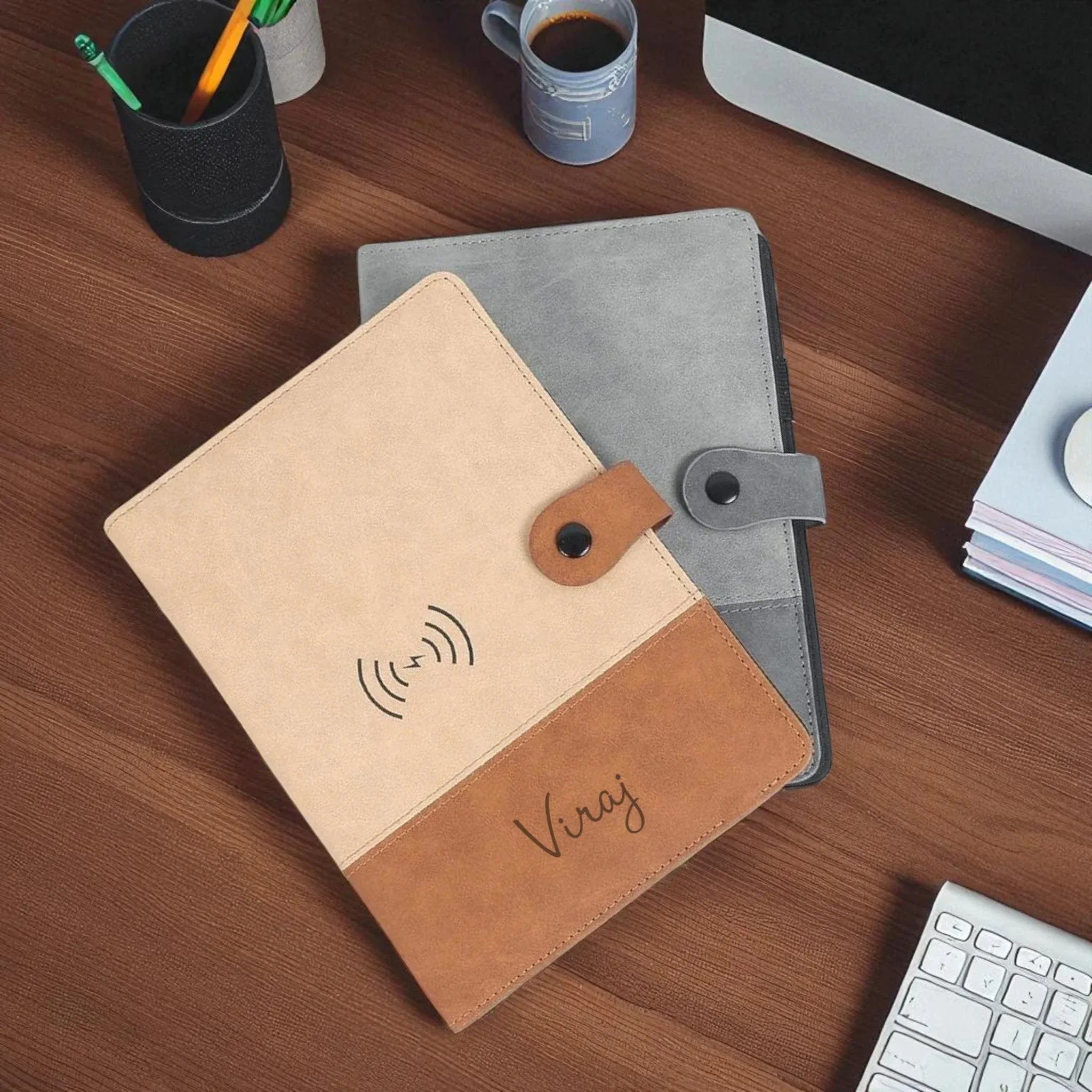 Personalized wireless charging notebook on wooden desk