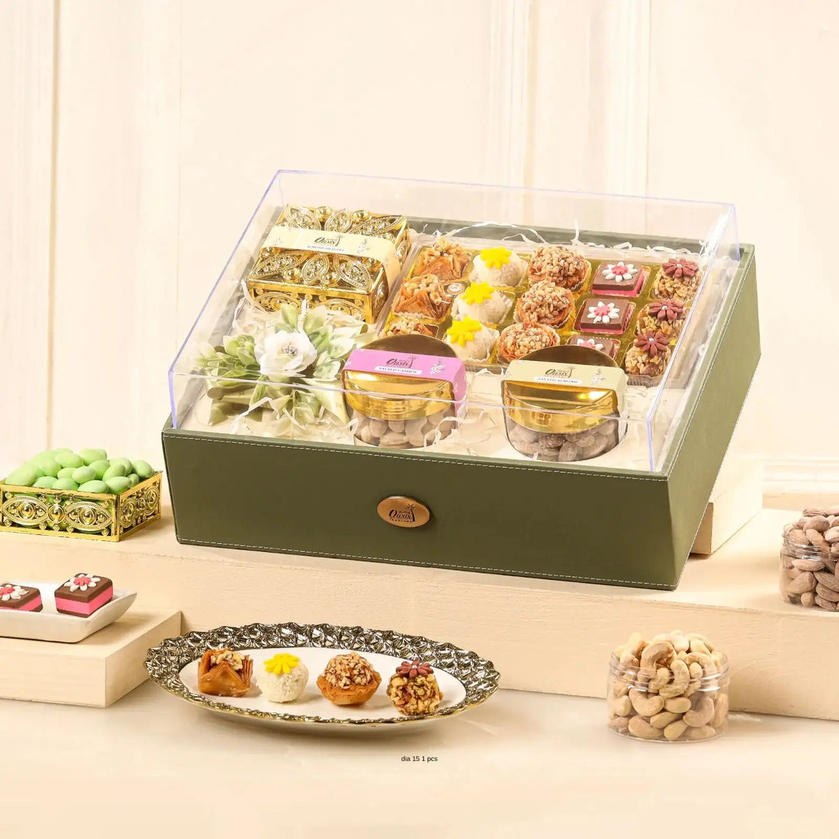 Handpicked Flavour Box | Gift Hampers Online featuring assorted sweets, dry fruits, and gourmet treats in a premium green gift basket.