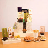 Timeless Treats Collection gift hamper with chocolates, cookies, dry fruits, and gourmet snacks. Ideal for festive and anniversary gifting.