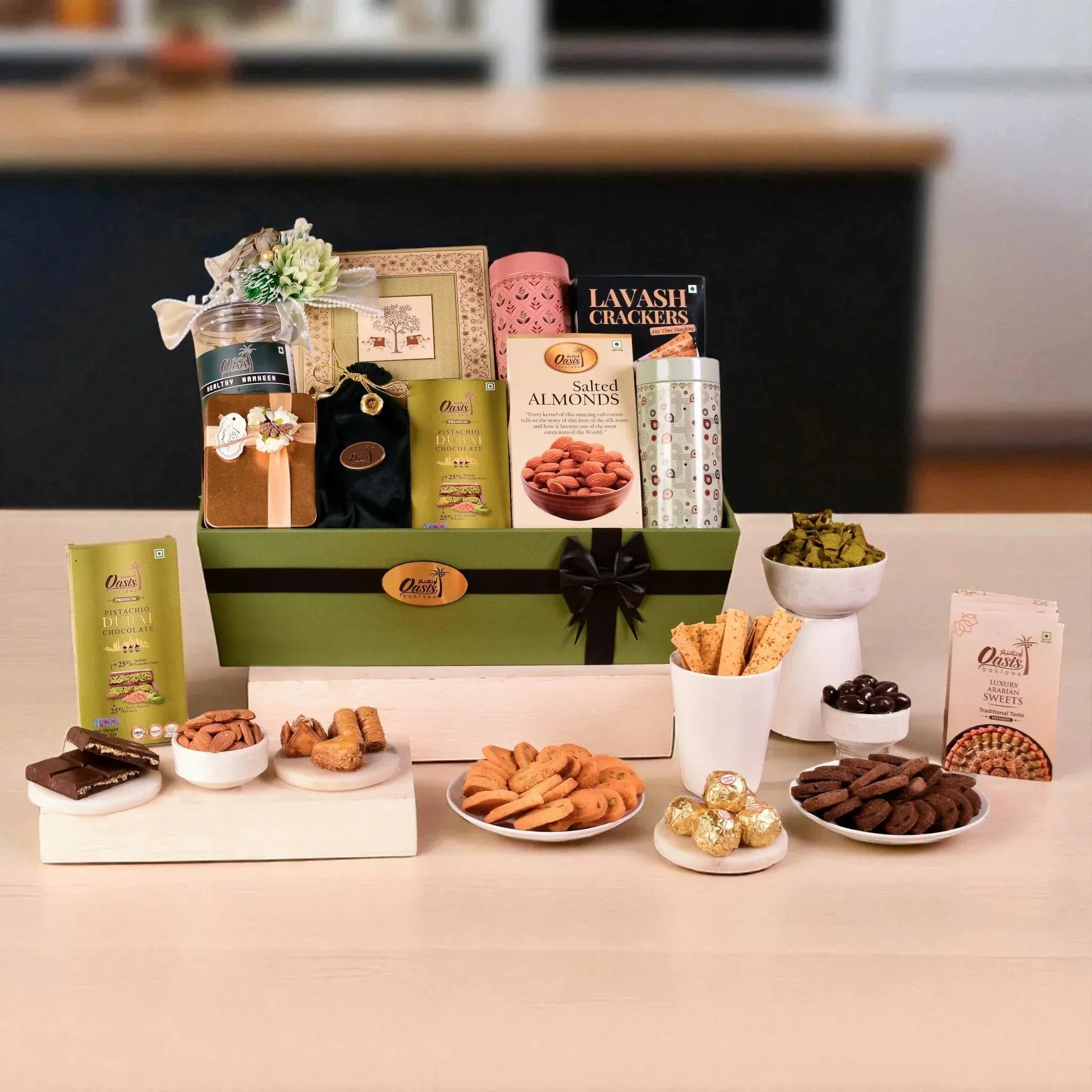 The Artisan Selection gift hamper with assorted cookies, chocolates, almonds, and crackers, ideal for festive and anniversary gifting.