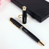 Black pen and lighter set with gold accents on a white background