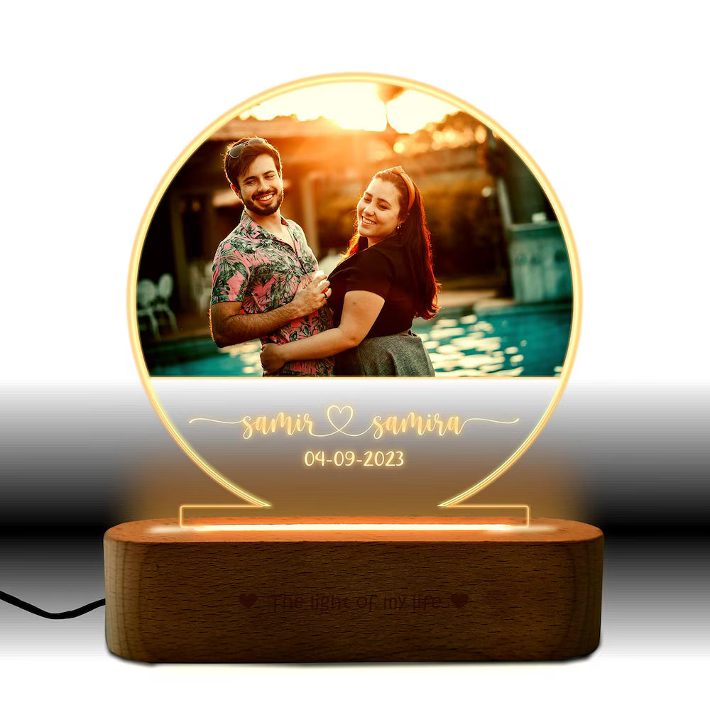 LED Custom Photo Lamp with warm light, showcasing a couple's photo and custom text on acrylic, set on a wooden base for personalized home lighting.
