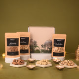 Three bags of almonds, cashews, and pistachios with their packaging on a green background.