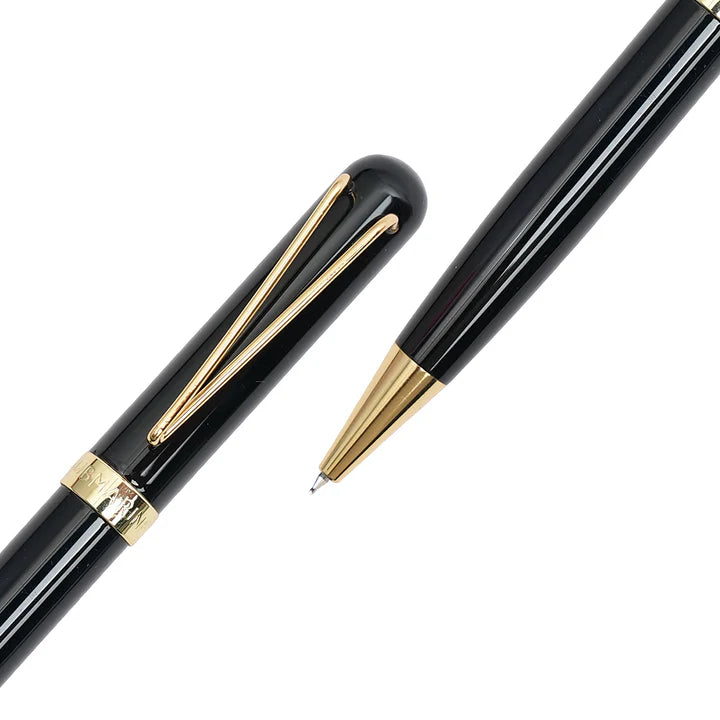 Black pen with gold accents on a white background