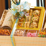 Top view of Grand Delights Gourmet Hamper showcasing baklava, nut clusters, and colorful candies in a luxury gift basket for festive gifting.