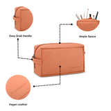 Orange toiletry bag with features highlighted on a white background