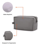Gray toiletry bag with water repellent feature and organizational design on a white background