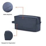 Navy toiletry bag with water repellent feature and Harrisons branding on a white background