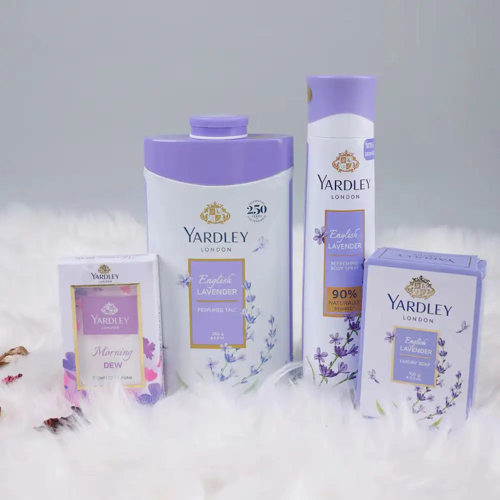 Yardley English Lavender Gifts for Women set with compact perfume, talc, body spray, and soap displayed on soft white fur.
