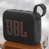Eco-Friendly BT Speaker GO4 in black with bold JBL logo, compact design and loop strap, ideal for corporate gifts and bulk tech gifting.