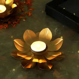 Golden lotus-shaped metal diya with tealight, included in the Diya & Delight Box for elegant Diwali décor and gifting.