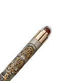 Decorative pen with intricate designs on a white background
