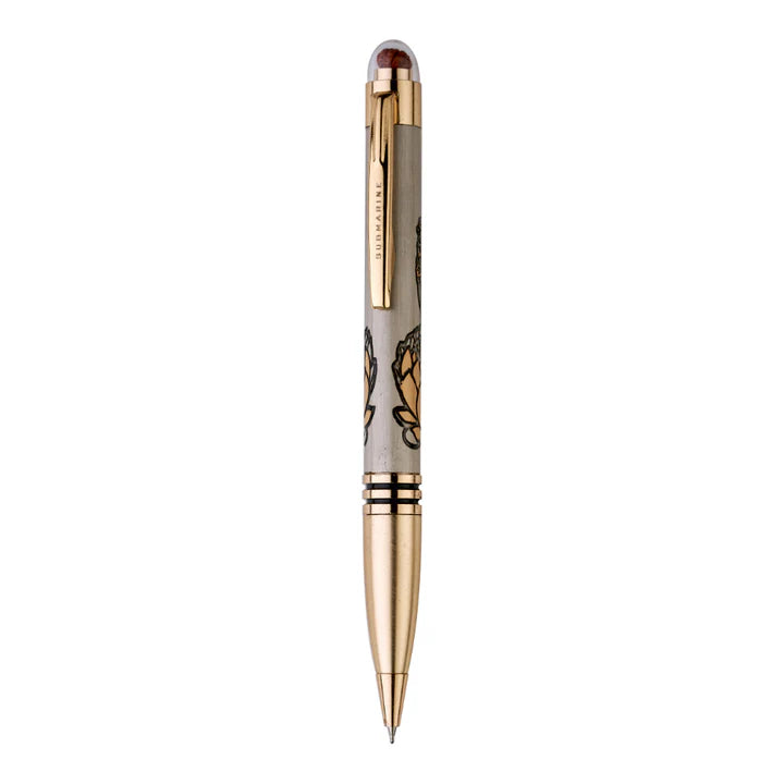Luxury pen with gold accents on a white background
