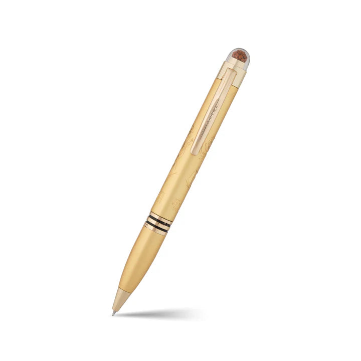 Gold pen on a white background