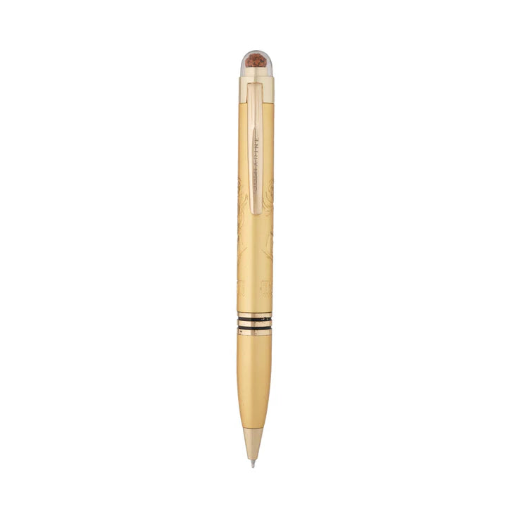 Gold pen on a white background