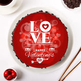 Heart-themed Chocolate Truffle Valentine Cake featuring red fondant top with love message, ideal for gifting on Valentine's Day with express delivery.