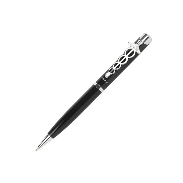 Black pen with decorative elements on a white background