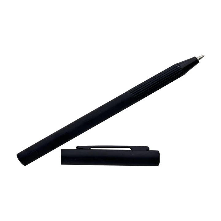Black pen and cap on a white background