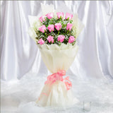 Pink roses bouquet with baby's breath flowers