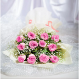 Elegant pink roses bouquet with white baby's breath