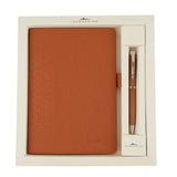 Brown notebook and pen set in a box with 'Submarine' branding.