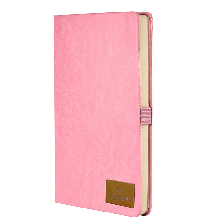 Pink notebook with a strap closure on a white background