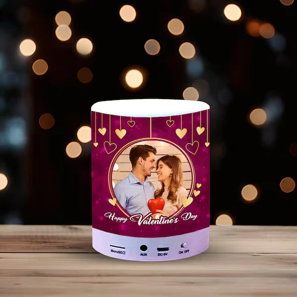 Compact personalized Bluetooth speaker featuring a couple's photo and 'Happy Valentine's Day' design, perfect for special occasions.