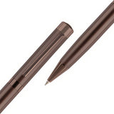 Two brown pens on a white background