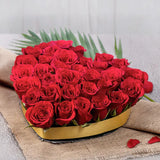 Heart-shaped box of Perky Blooms red roses with golden trim, ideal for Valentine's Day gifts and romantic flower delivery.