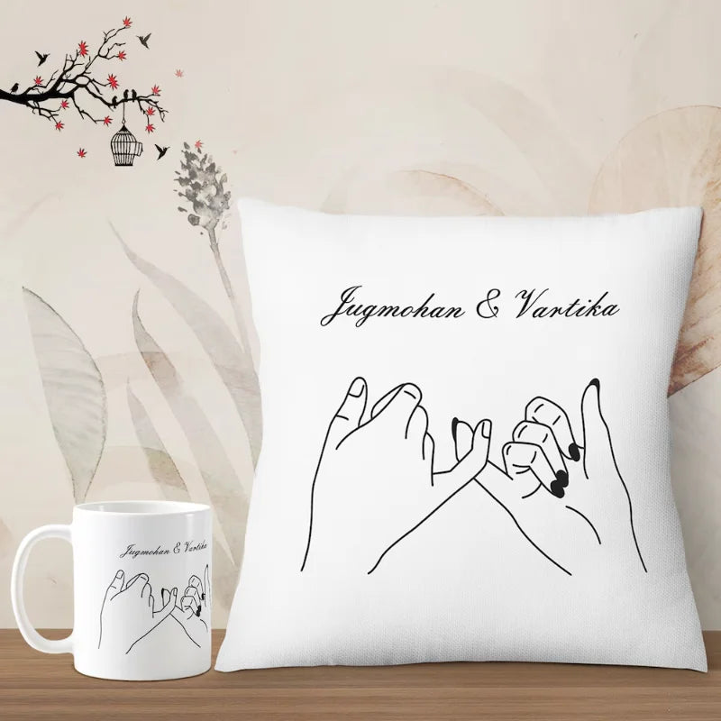 Personalized mug and cushion combo featuring pinky promise artwork and names Jugmohan & Vartika. Unique romantic gift for special occasions.