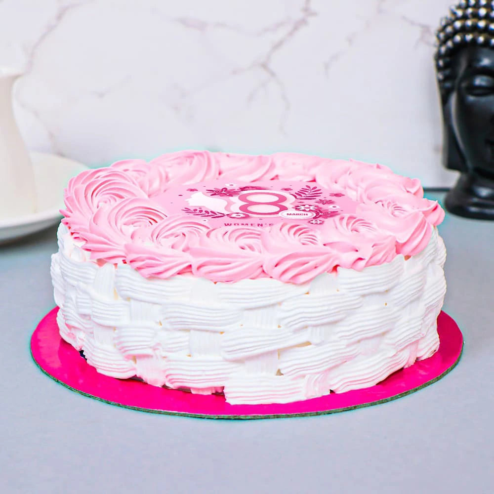 Side view of Pink Women's Day Rosette Cake with pink frosting