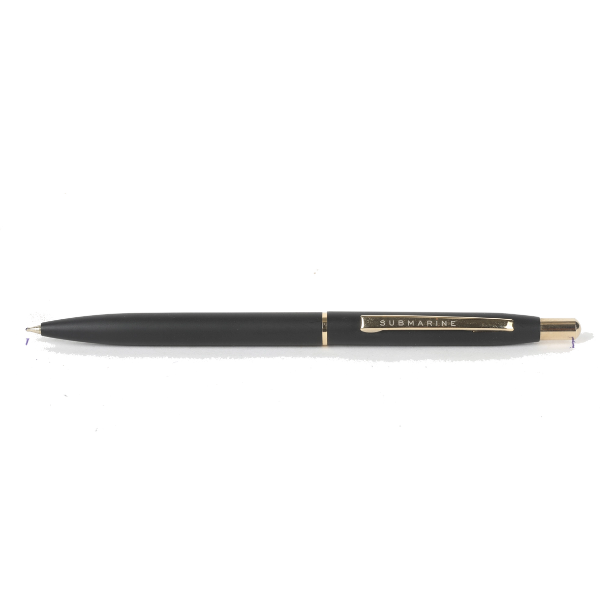 Black pen with gold accents on a white background
