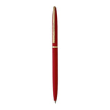 Red pen with gold accents on a white background