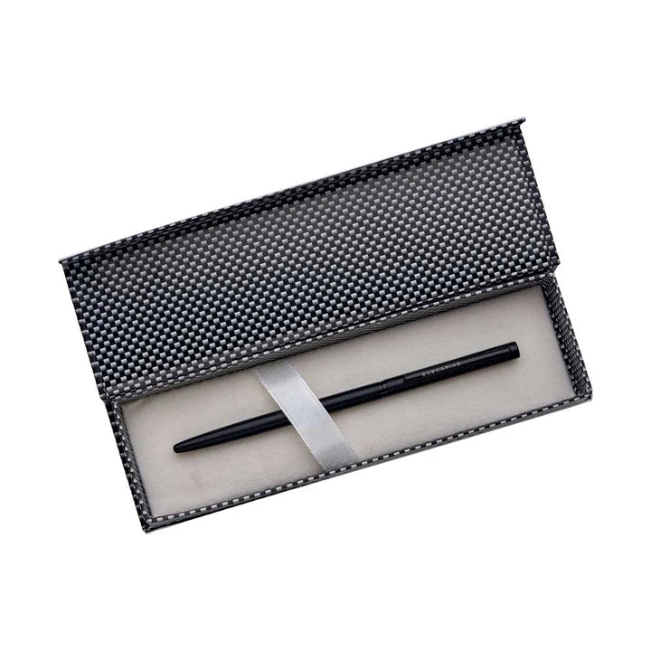 Black pen in a textured case on a white background