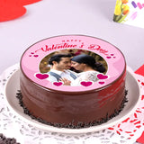 Valentine Special Truffle Photo Treat - Valentine cupcake treat with glossy chocolate finish, edible photo print, and pink heart accents.