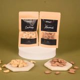 Premium roasted almonds and cashews in resealable pouches from The Nutcracker Treat Box, ideal for Diwali dry fruit hampers.