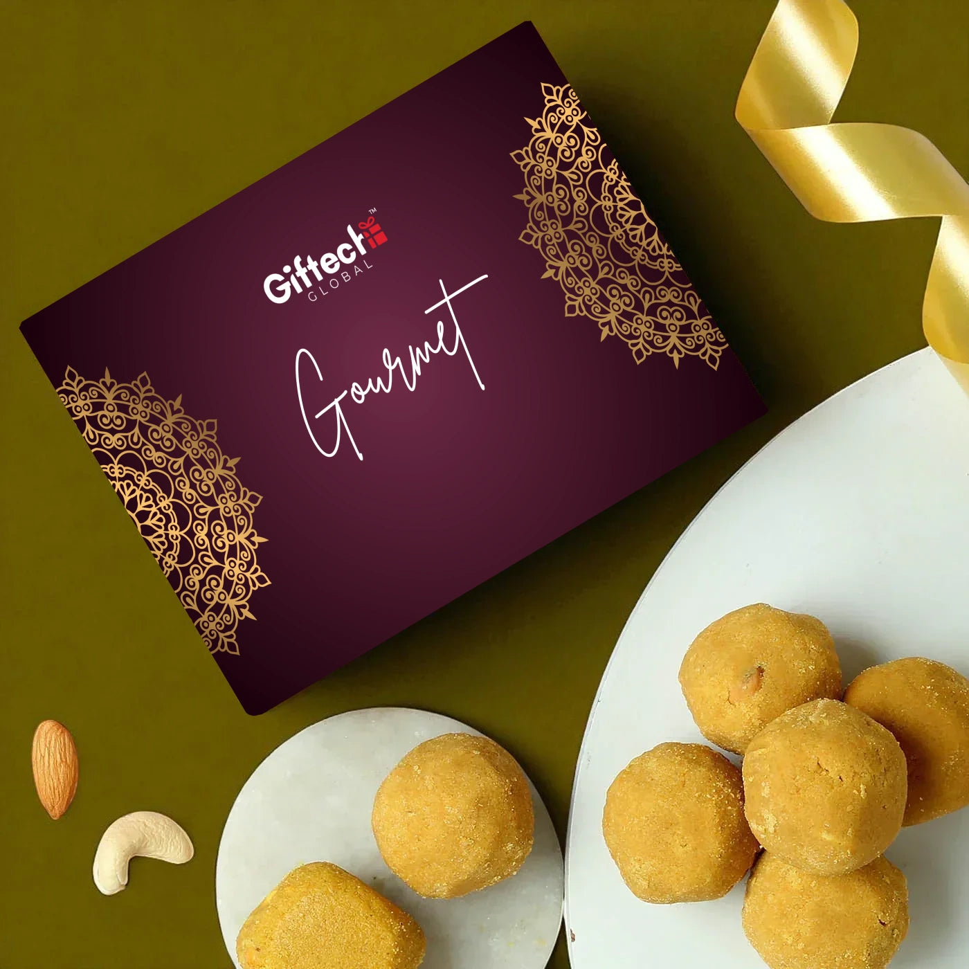 Gifteek gourmet box with a plate of yellow treats and nuts on a green background