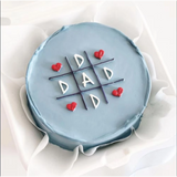 Blue birthday cake with hearts and 'Dad' message