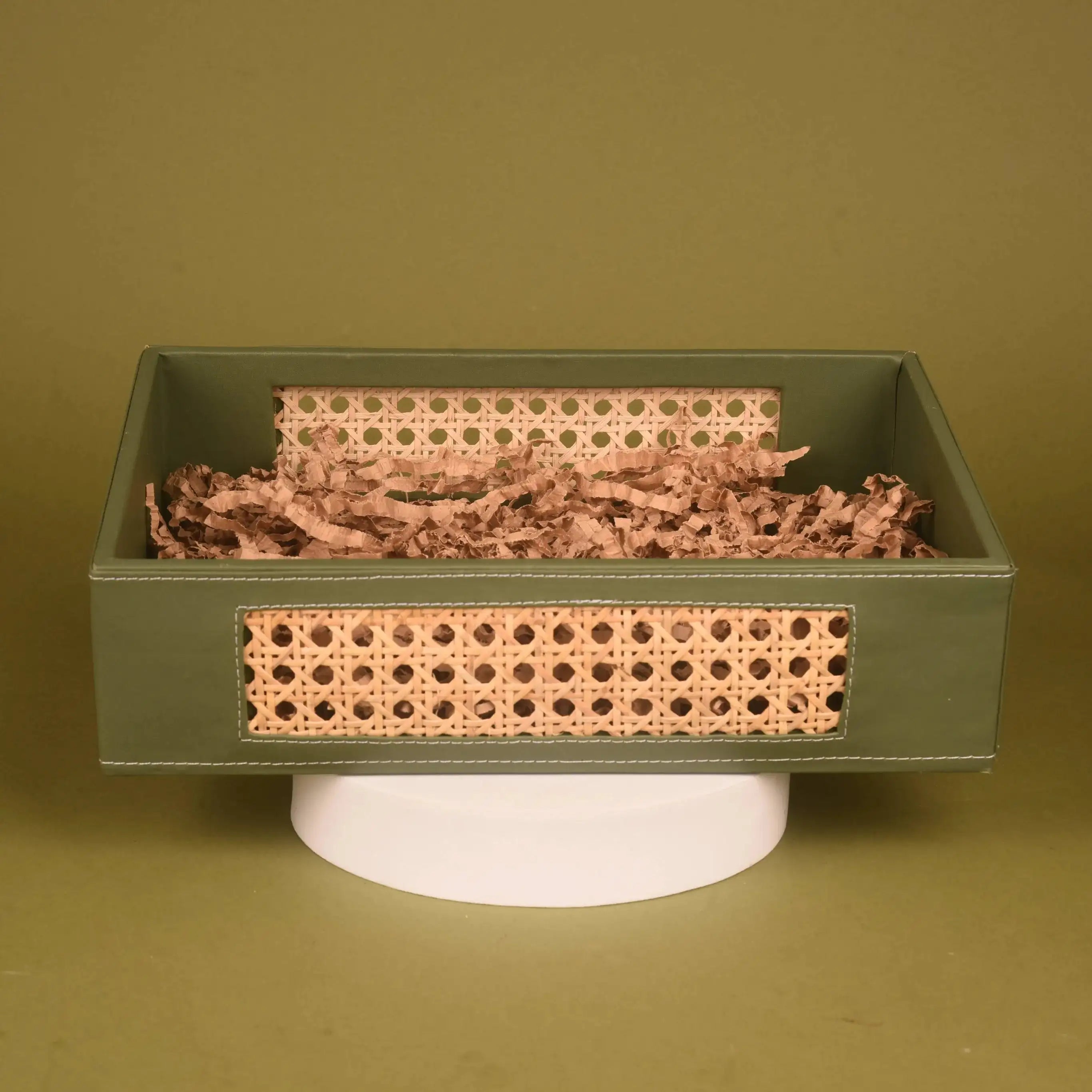 Empty decorative green and cane basket from The Morning Ritual Box, ideal for presenting gourmet Diwali gift hampers.