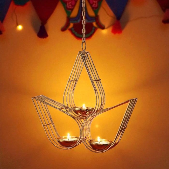 Decorative hanging lamp with candles on an orange background
