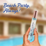 Hand holding Hawaiian Rumba Eau de Parfum 15ml with poolside background, promoting beach party-ready, energizing fragrance.