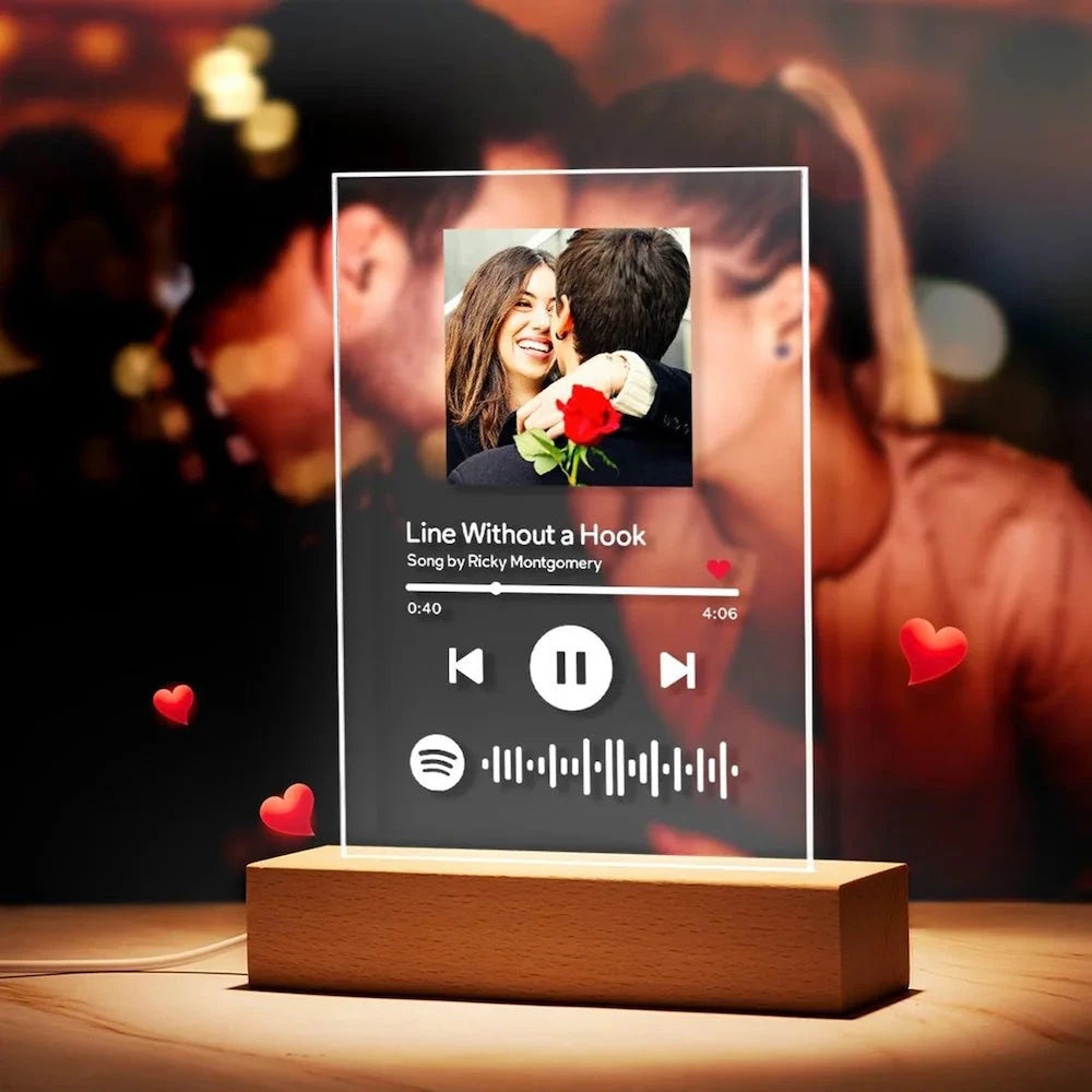 Custom Lyrics Picture Frame - Unique Gift Ideas featuring a romantic couple photo with LED base and personalized Spotify song code, ideal for special occasions.