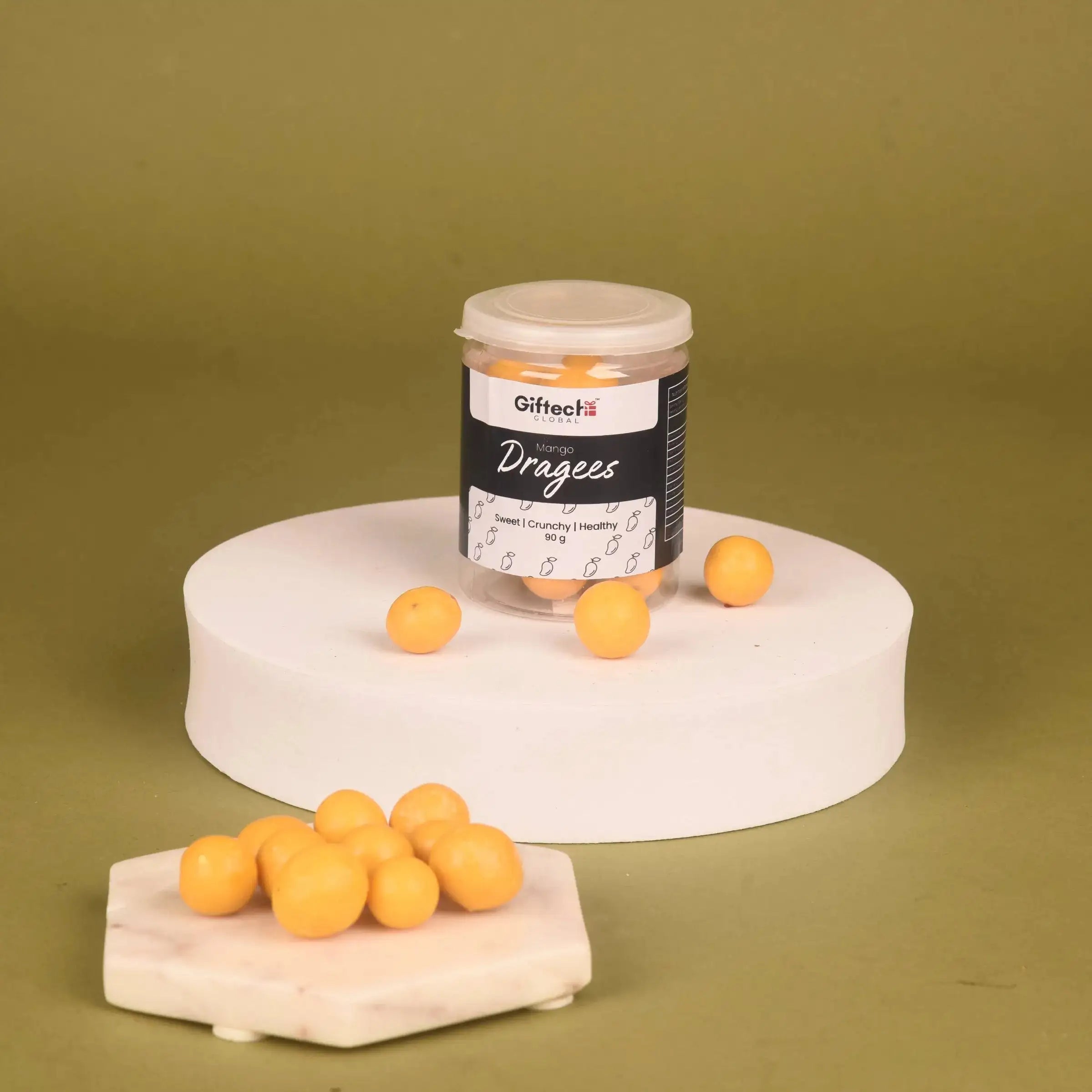 Yellow chocolate-coated dragees from the Cocoa & Crunch Box, a sweet and crunchy treat in this premium Diwali gift hamper.