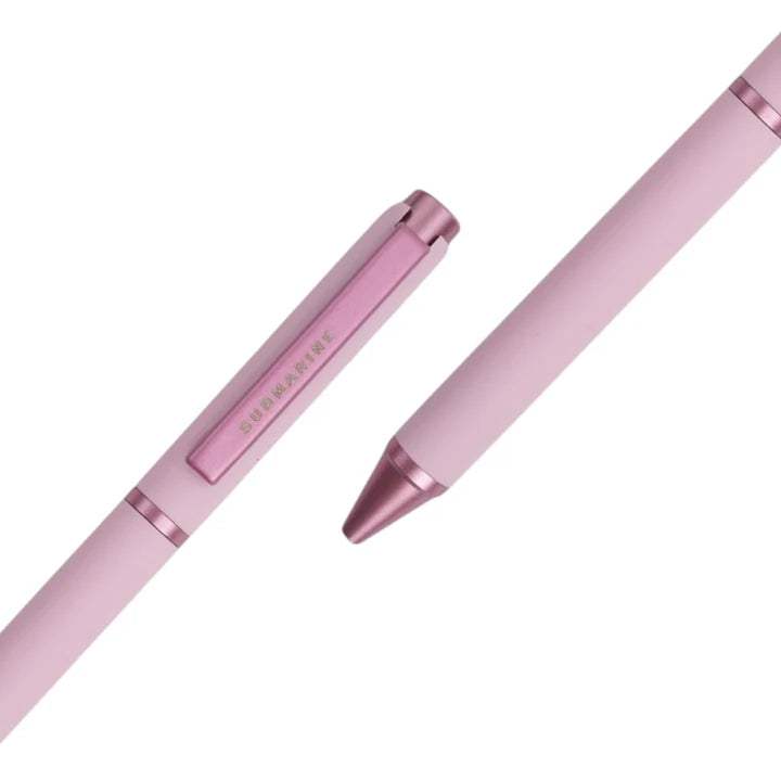 Pink pen with a metallic cap on a white background